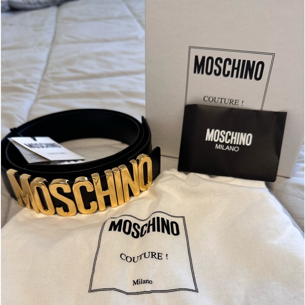 Brand new with tags Moschino belt. Comes with box, dust bag, tag and card